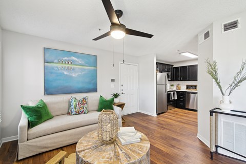 a living room with a couch and a ceiling fan at Elme Druid Hills, Atlanta, GA