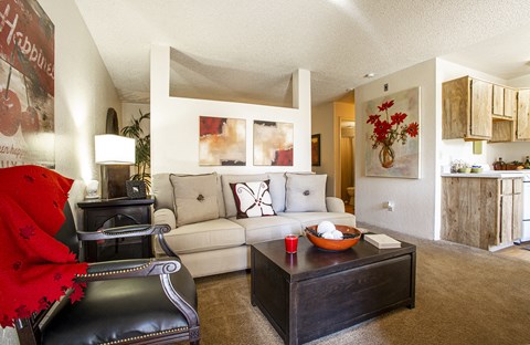 a living room with a couch and a coffee table