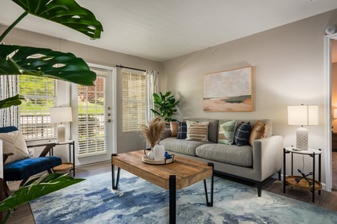 a living room with a couch and a coffee table