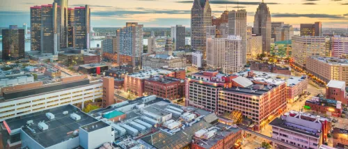 View of Detroit, MI's city center at sunset.