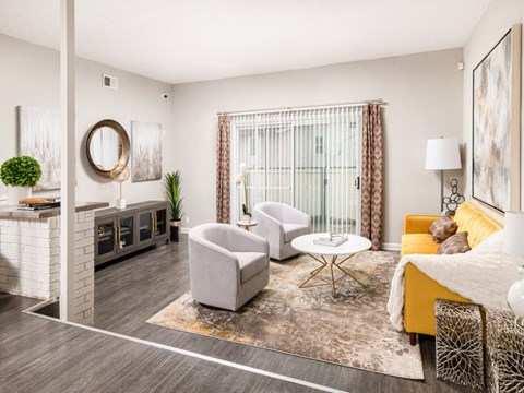 Living Room With Kitchen View at Elite at City View, Georgia