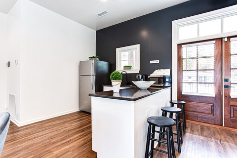 Kitchen with bar stools at Parkside at Sandy Springs