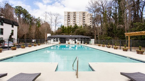 Sparkling pool with sundeck at Parkside Sandy Springs