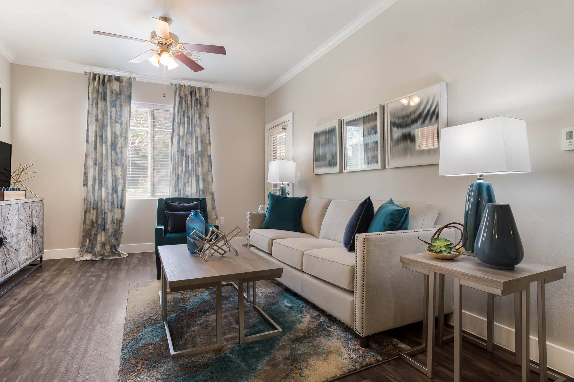 a living room with a couch and a table