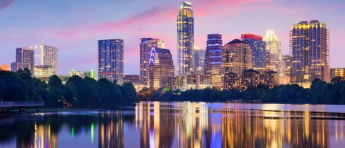 view of Austin buildings in the sunset